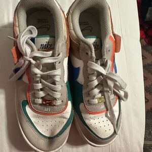 Nike Kids Sneakers - White, Blue, and Orange Accents